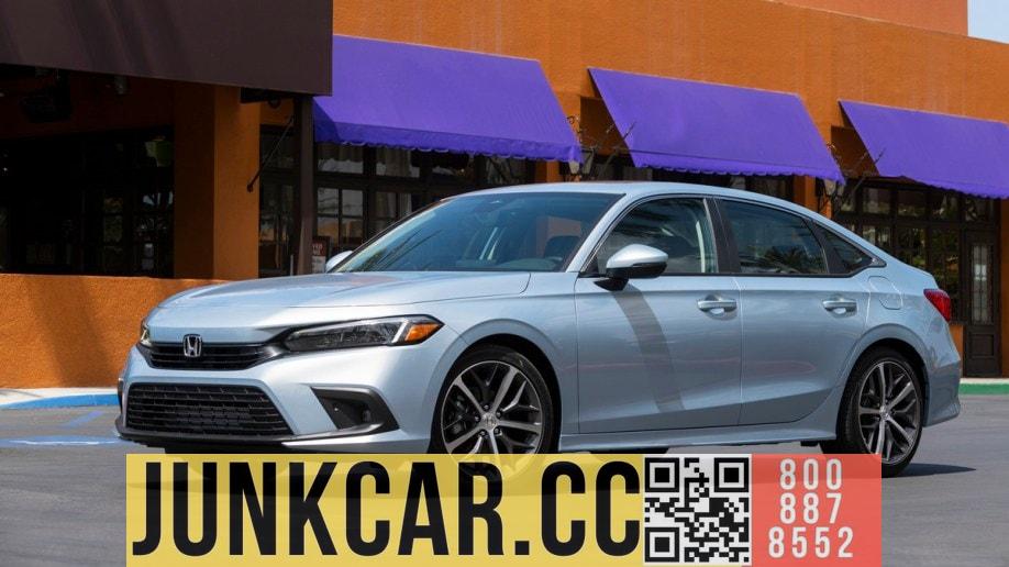 A silver 2022 Honda Civic sedan near a purple awning.